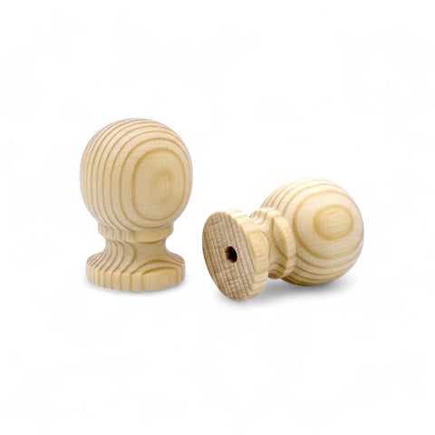 Close-up of 33 mm pine wooden cabinet knob showing wood grain