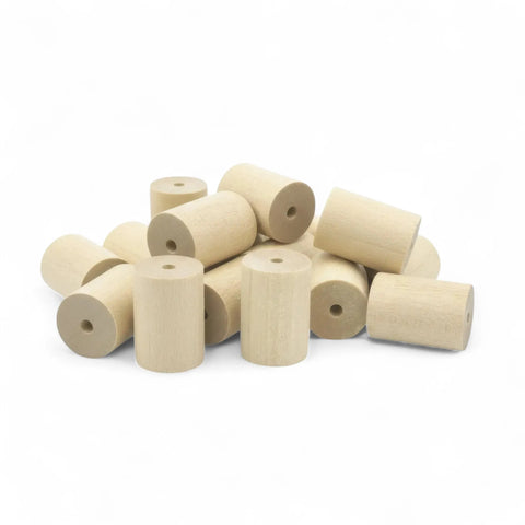 pile of 20 × 28 mm birch wood cylinders with holes