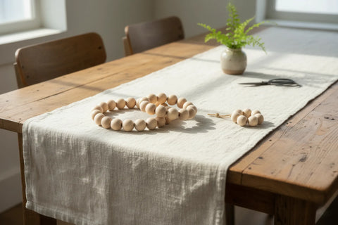 Decorative strand of turned wooden beads used as table decor
