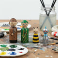 Hand-painted two-part treitud puidust pulknukud as characters